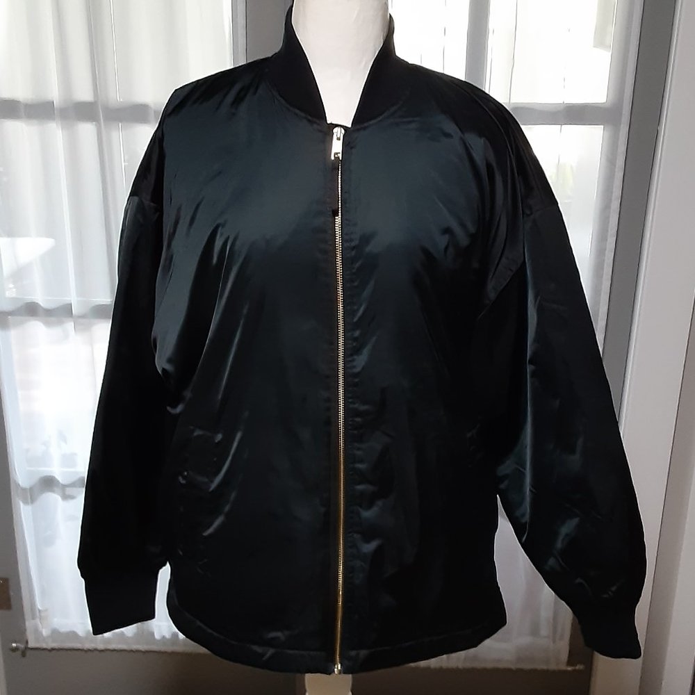 Women's a new day light weight water resistant black coat size L. Retail $50.00.